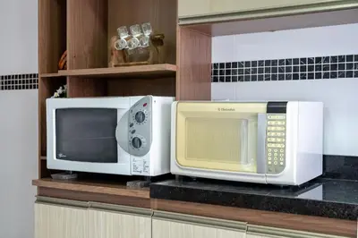 A cozinha ou kitchenette de Achei Itapema • Casa, 4 suítes + Área Gourmet