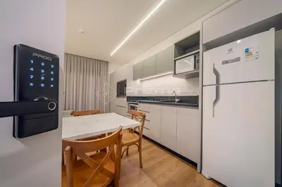 A cozinha ou kitchenette de 313 Flat Moderno e Bem Localizado a 120 metros da praia de Bombinhas Até 4 Pessoas