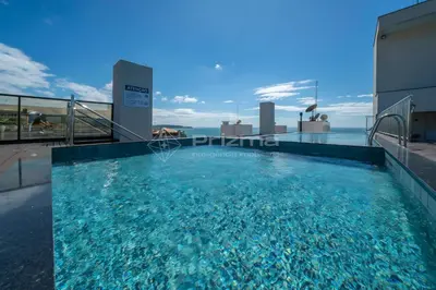 A piscina em ou perto de 313 Flat Moderno e Bem Localizado a 120 metros da praia de Bombinhas Até 4 Pessoas