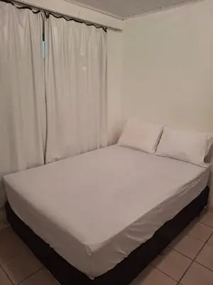Uma cama ou camas num quarto em Casa em bc para temporada