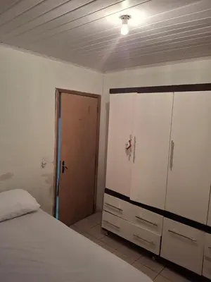 Uma cama ou camas num quarto em Casa em bc para temporada