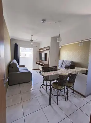 Uma área de estar em Alugo Apartamento em Itapema