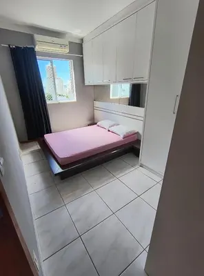 Uma cama ou camas num quarto em Alugo Apartamento em Itapema