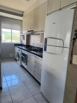 A cozinha ou kitchenette de Alugo Apartamento em Itapema