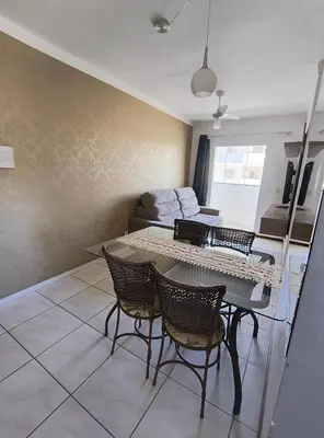 Uma área de estar em Alugo Apartamento em Itapema