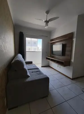 Uma televisão e/ou sistema de entretenimento em Alugo Apartamento em Itapema