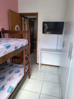 Uma cama ou camas num quarto em Alugo Apartamento em Itapema