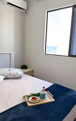 Uma cama ou camas num quarto em Apto Figueiras|3Q,Climatizado,Sacada Churrasqueira
