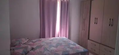 Uma cama ou camas num quarto em Fim de rua