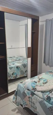 Uma cama ou camas num quarto em Fim de rua