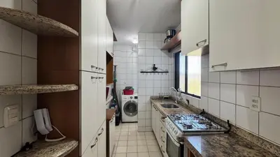 A cozinha ou kitchenette de Apartamento Quadra Mar em Balneário Camboriú
