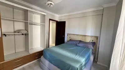 Uma cama ou camas num quarto em Apartamento Quadra Mar em Balneário Camboriú