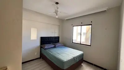 Uma cama ou camas num quarto em Apartamento Quadra Mar em Balneário Camboriú