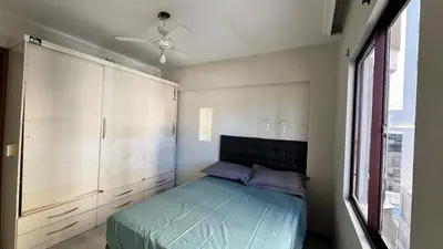 Uma cama ou camas num quarto em Apartamento Quadra Mar em Balneário Camboriú