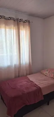 Uma cama ou camas num quarto em Casa tranquila