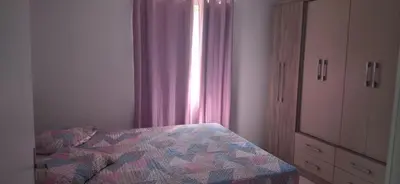 Uma cama ou camas num quarto em Casa tranquila