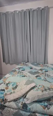 Uma cama ou camas num quarto em Casa tranquila