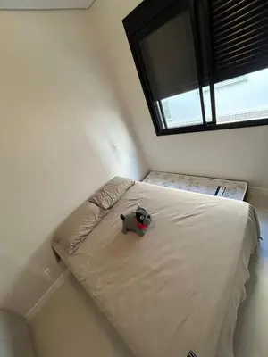 Uma cama ou camas num quarto em Apto Palmas - Refugio