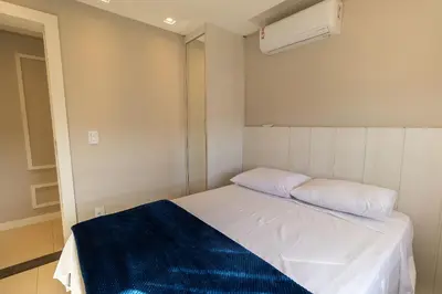 Uma cama ou camas num quarto em Residencial Solar de Bombas