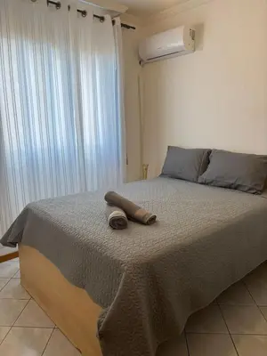 Uma cama ou camas num quarto em Apartamento Frente Mar na Meia Praia