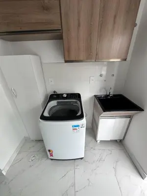 A cozinha ou kitchenette de Apt 2 suites Novo 180M da Praia Completo