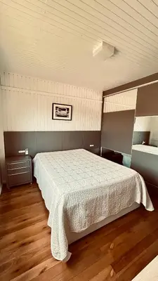 Uma cama ou camas num quarto em Casa Pena Branca Villa Ararybó