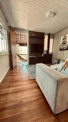 Uma área de estar em Casa Pena Branca Villa Ararybó