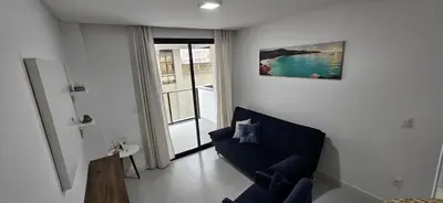 Uma área de estar em Apartamento Mobiliado 6 Lug Ar Condi garagem sacada