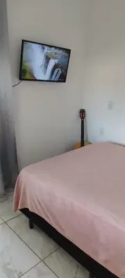Uma cama ou camas num quarto em Apto D 1º Andar