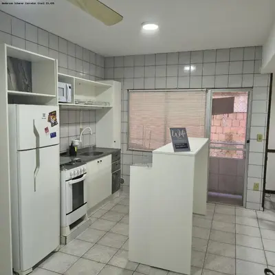 A cozinha ou kitchenette de Tu Verano En Itapema Brasil! Departamento A Solo 2 Cuadras Del Mar Para 6 Personas