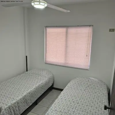Uma cama ou camas num quarto em Tu Verano En Itapema Brasil! Departamento A Solo 2 Cuadras Del Mar Para 6 Personas