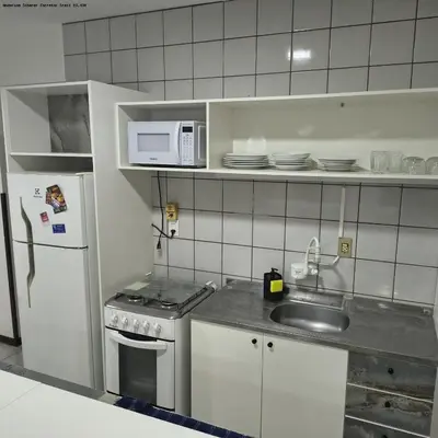 A cozinha ou kitchenette de Tu Verano En Itapema Brasil! Departamento A Solo 2 Cuadras Del Mar Para 6 Personas