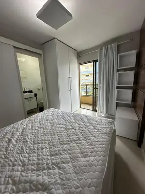Uma cama ou camas num quarto em Apartamento Completo em Bombinhas - Atol das Rocas - SC