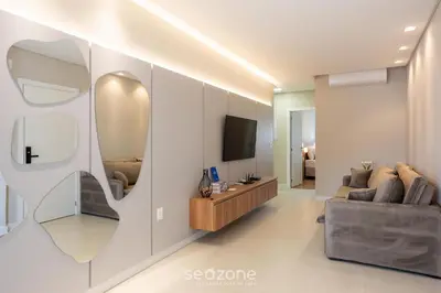 Uma televisão e/ou sistema de entretenimento em Apto c/ Churrasqueira a 500m da Praia TDF0302