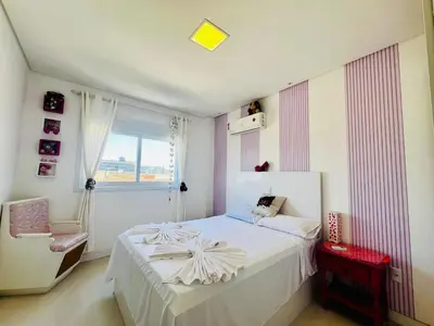 Uma cama ou camas num quarto em Cobertura duplex, vista panorâmica e SPA