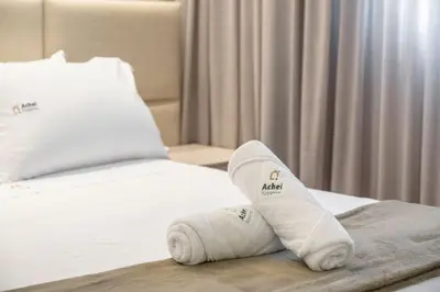 Uma cama ou camas num quarto em Achei Itapema • Chatêau Saint Michel, R.302
