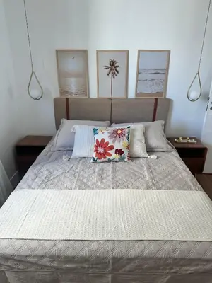 Uma cama ou camas num quarto em Cobertura Vista Mar-Premium na Meia Praia-12ºandar