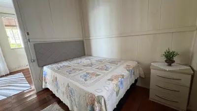 Uma cama ou camas num quarto em Recanto pé na areia