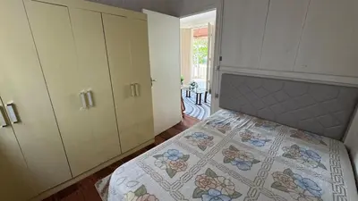 Uma cama ou camas num quarto em Recanto pé na areia