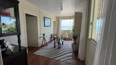 Uma área de estar em Recanto pé na areia