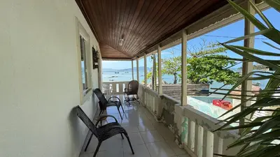 Uma varanda ou terraço em Recanto pé na areia