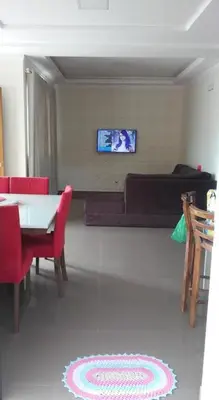 Uma televisão e/ou sistema de entretenimento em Linda casa