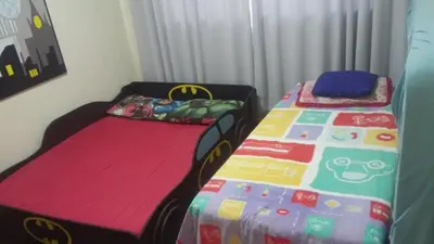 Uma cama ou camas num quarto em Linda casa