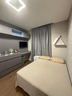 Uma cama ou camas num quarto em Casa para Temporada em Camboriú