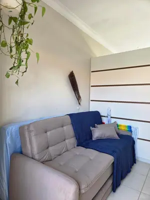 Uma área de estar em Loft a 50 metros Praia central de Bombinhas
