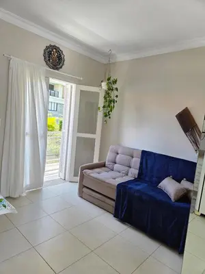 Uma área de estar em Loft a 50 metros Praia central de Bombinhas