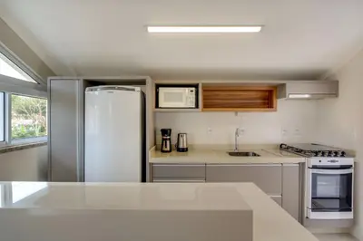 A cozinha ou kitchenette de Residencial Casa Flora - Centro de Bombinhas