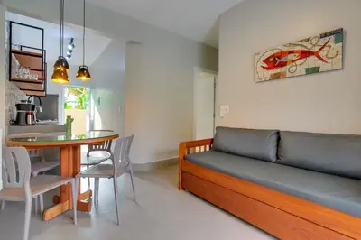 Uma área de estar em Residencial Casa Flora - Centro de Bombinhas