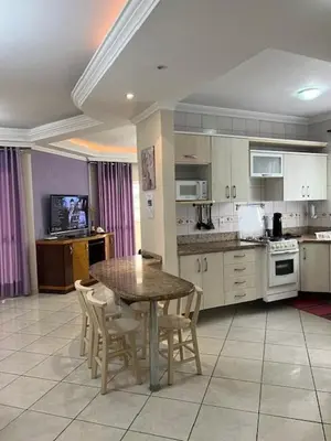 A cozinha ou kitchenette de Apto a 80 metros do mar para 8 pessoas