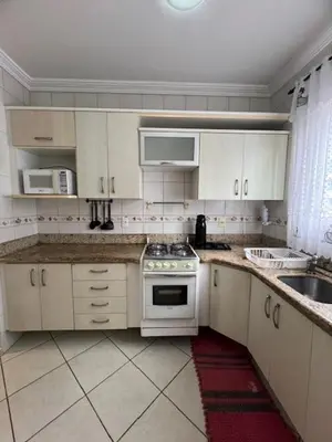 A cozinha ou kitchenette de Apto a 80 metros do mar para 8 pessoas